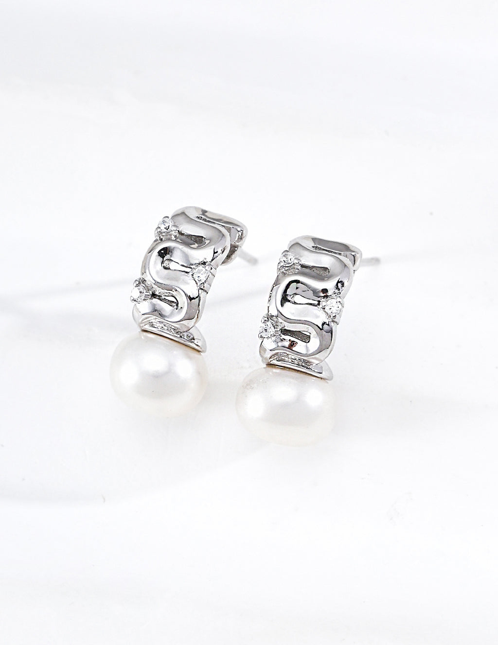 Pearl and zircon earrings