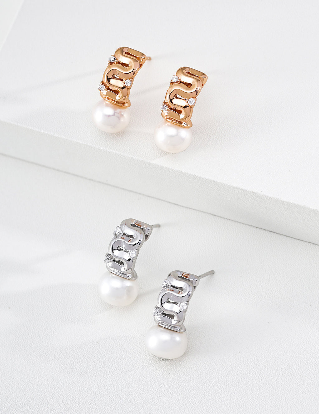 Pearl and zircon earrings