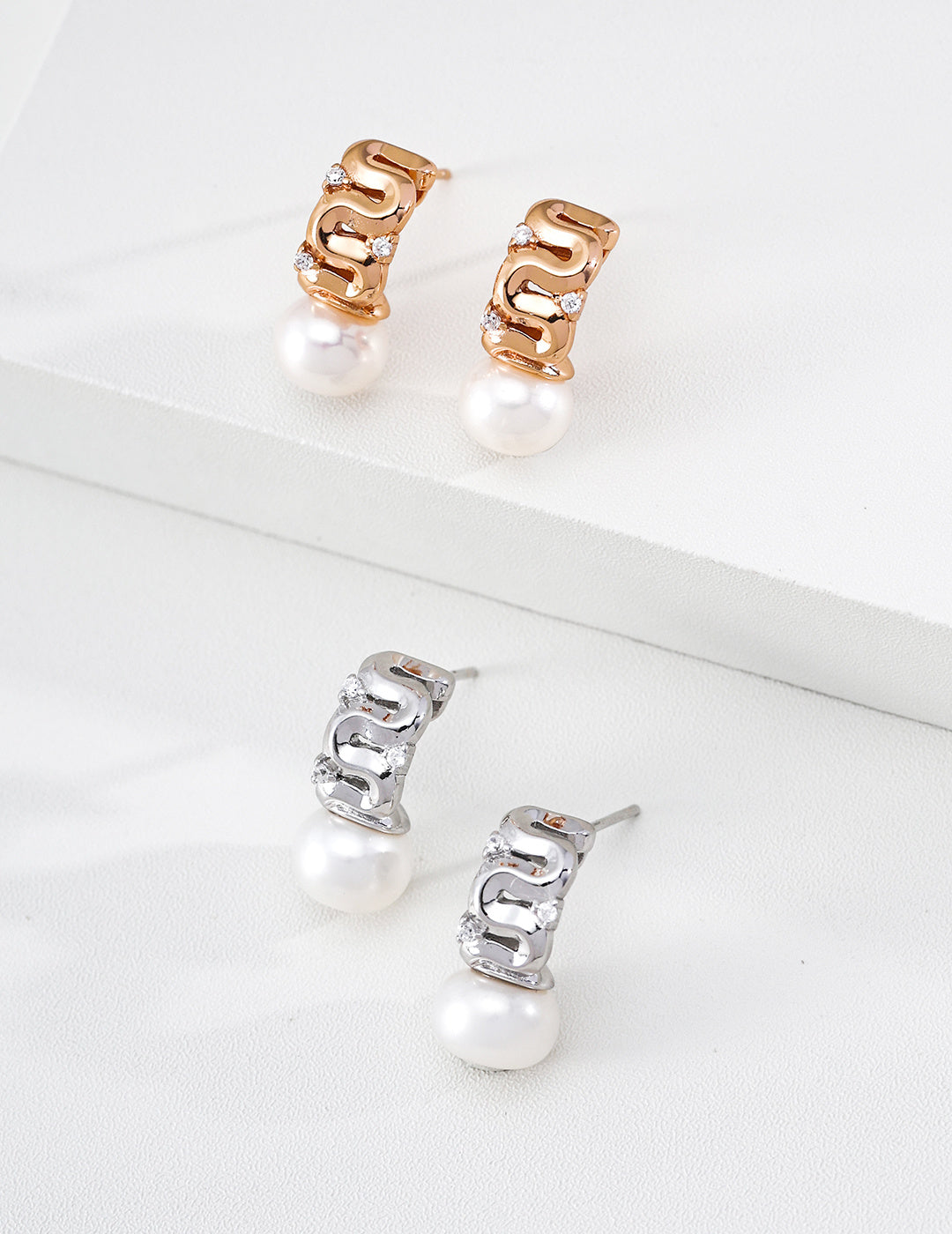 Pearl and zircon earrings